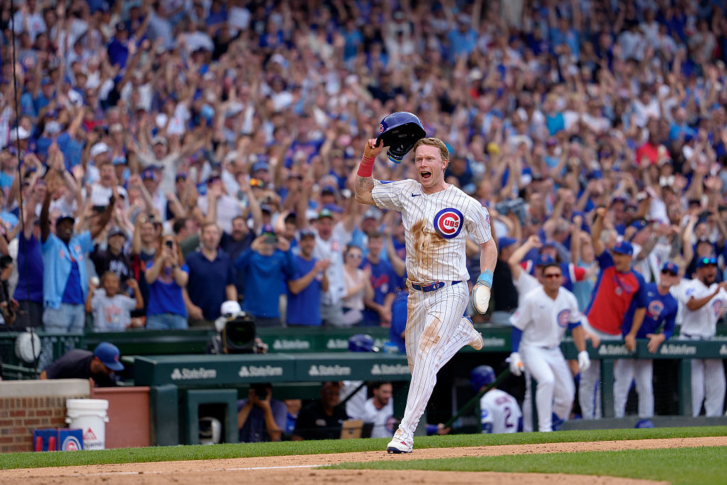 CHICAGO, ILLINOIS - AUGUST 6: Pete Crow-Armstrong #4 of the Chicago Cubs celebrates as he scores the game-winning run against the Toronto Blue Jays at Wrigley Field on August 6, 2026 in Chicago, Illinois. (Photo by Matt Dirksen/Chicago Cubs/Getty Images)