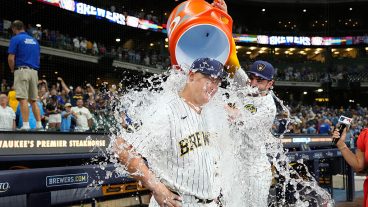 MILWAUKEE, WISCONSIN - AUGUST 08: Garrett Mitchell #5 of the Milwaukee Brewers dumps Gatorade on teammate Andrew Vaughn #28 after their team's 4-3 win over the Minnesota Twins at American Family Field on August 08, 2026 in Milwaukee, Wisconsin. (Photo by John Fisher/Getty Images)