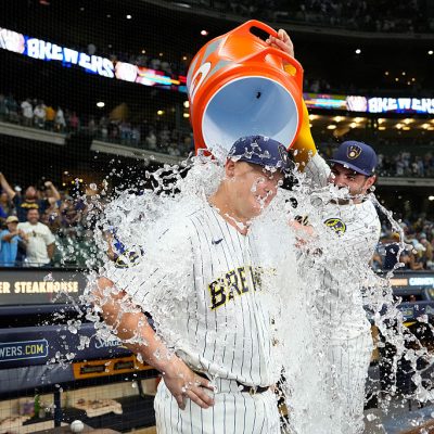 MILWAUKEE, WISCONSIN - AUGUST 08: Garrett Mitchell #5 of the Milwaukee Brewers dumps Gatorade on teammate Andrew Vaughn #28 after their team's 4-3 win over the Minnesota Twins at American Family Field on August 08, 2026 in Milwaukee, Wisconsin. (Photo by John Fisher/Getty Images)