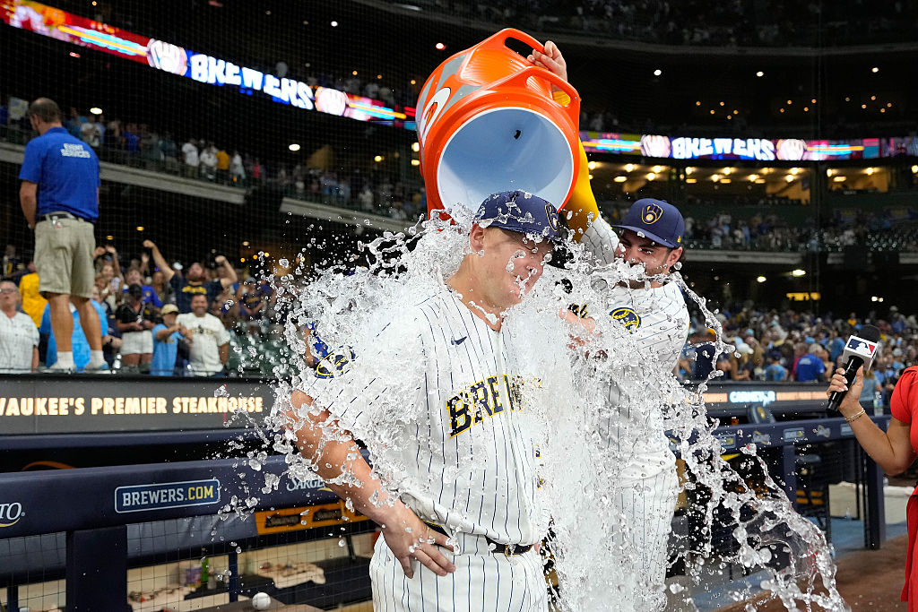 MILWAUKEE, WISCONSIN - AUGUST 08: Garrett Mitchell #5 of the Milwaukee Brewers dumps Gatorade on teammate Andrew Vaughn #28 after their team's 4-3 win over the Minnesota Twins at American Family Field on August 08, 2026 in Milwaukee, Wisconsin. (Photo by John Fisher/Getty Images)