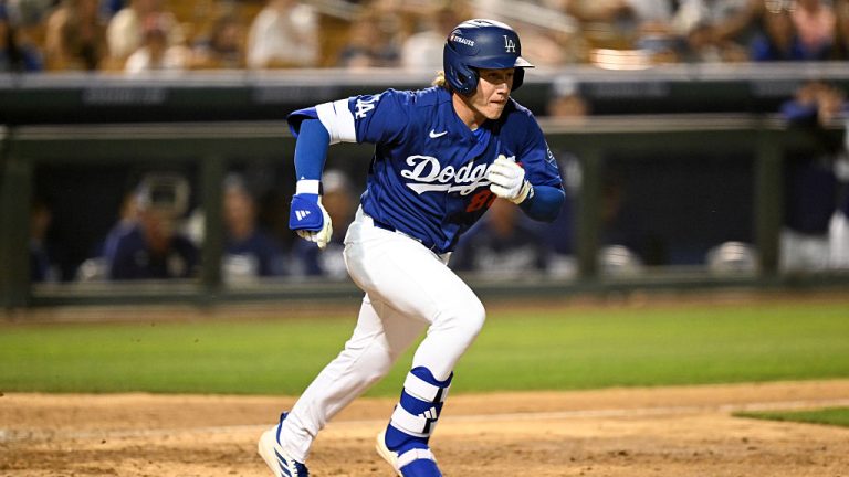 GLENDALE, ARIZONA - MARCH 20, 2026: Charles Davalan #88 of the Los Angeles Dodgers runs out a foul ball during the sixth inning of a spring training game against the San Diego Padres at Camelback Ranch on March 20, 2026 in Glendale, Arizona. (Photo by Chris Bernacchi/Diamond Images via Getty Images)