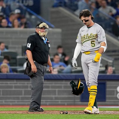 TORONTO, ON - MARCH 27: Jacob Wilson #5 of the Athletics reacts to striking out in the ninth inning during the game between the Athletics and the Toronto Blue Jays at Rogers Centre on Friday, March 27, 2026 in Toronto, Ontario, Canada. (Photo by Thomas Skrlj/MLB Photos via Getty Images)