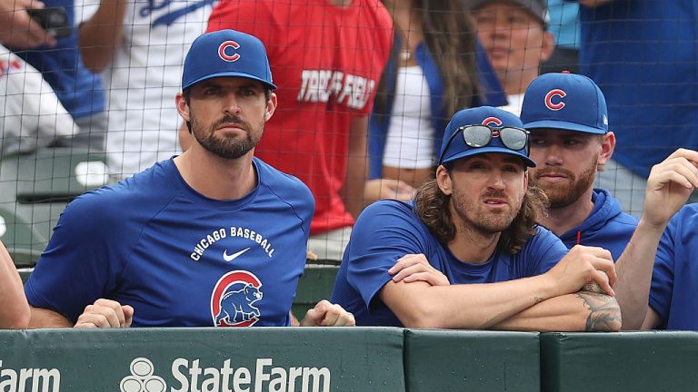 CHICAGO, ILLINOIS - AUGUST 05: Clay Holmes and Kevin Gausman of the Chicago Cubs look on against the Los Angeles Dodgers at Wrigley Field on August 05, 2026 in Chicago, Illinois. (Photo by Michael Reaves/Getty Images)