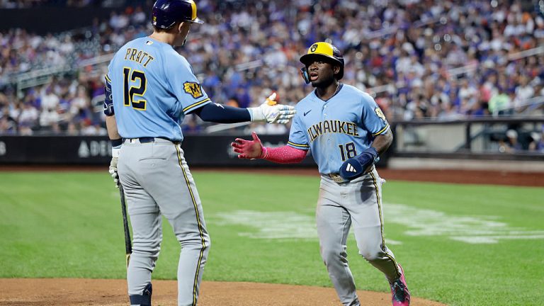 NEW YORK, NEW YORK - AUGUST 26: Luis Lara #18 of the Milwaukee Brewers celebrates his run during the second inning against the New York Mets with teammate Cooper Pratt #12 at Citi Field on August 26, 2026 in New York City. (Photo by Jim McIsaac/Getty Images)