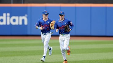 NEW YORK, NEW YORK - SEPTEMBER 06: A.J. Ewing #9 (L) and Carson Benge #3 of the New York Mets in action against the San Francisco Giants at Citi Field on September 06, 2026 in New York City. The Mets defeated the Giants 4-2. (Photo by Jim McIsaac/Getty Images)