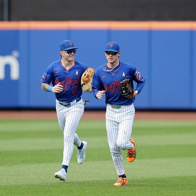 NEW YORK, NEW YORK - SEPTEMBER 06: A.J. Ewing #9 (L) and Carson Benge #3 of the New York Mets in action against the San Francisco Giants at Citi Field on September 06, 2026 in New York City. The Mets defeated the Giants 4-2. (Photo by Jim McIsaac/Getty Images)