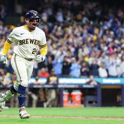 MILWAUKEE, WI - OCTOBER 03: William Contreras #24 of the Milwaukee Brewers celebrates as he rounds the bases after hitting a solo home run in the seventh inning during Game One of the National League Division Series presented by Booking.com between the San Diego Padres and the Milwaukee Brewers at American Family Field on Saturday, October 3, 2026 in Milwaukee, Wisconsin. (Photo by Rob Tringali/MLB Photos via Getty Images)