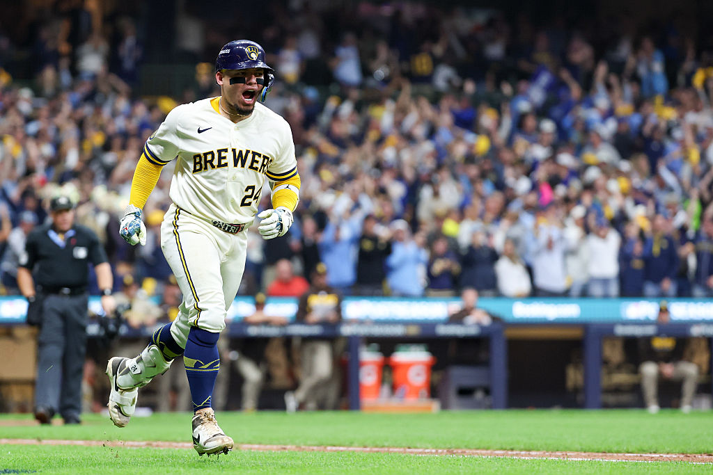 MILWAUKEE, WI - OCTOBER 03: William Contreras #24 of the Milwaukee Brewers celebrates as he rounds the bases after hitting a solo home run in the seventh inning during Game One of the National League Division Series presented by Booking.com between the San Diego Padres and the Milwaukee Brewers at American Family Field on Saturday, October 3, 2026 in Milwaukee, Wisconsin. (Photo by Rob Tringali/MLB Photos via Getty Images)